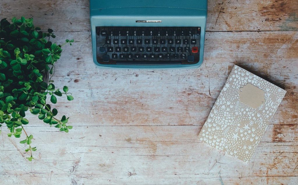 Typewriter on wood table